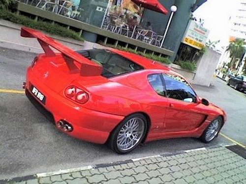 Putting a dopey wing on a Ferrari 456 GT should be enough to get you stoned 